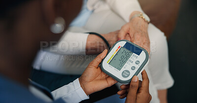 Buy stock photo Hands, nurse and blood pressure monitor for patient with test, service or results for wellness check. Caregiver, senior person and screen for assessment, healthcare exam or retirement in nursing home
