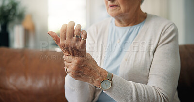 Buy stock photo Elderly woman, hands and wrist pain with injury on sofa for carpal tunnel syndrome in home. Closeup, senior or female person with sore arm or ache for joint inflammation, arthritis or muscle tension