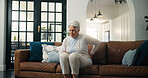 Upset, old woman and back pain in home with arthritis, osteoporosis and fatigue from medical problem. Elderly person, spine injury and hurt in living room with fibromyalgia, muscle tension and issue.