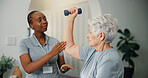 Woman, physiotherapist or senior patient with dumbbell for strength training or muscle recovery. Female person, physio or elderly client lifting with weight for fitness rehabilitation in practice