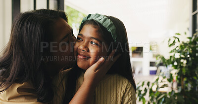 Buy stock photo Cheek kiss, mom and daughter in house with love, motherhood and bonding together for child growth. Mothers Day, woman and kid with happiness, healthy relationship or connection in emotional security.