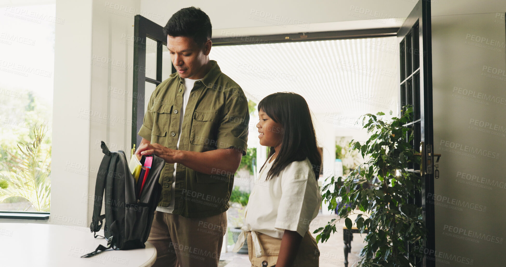 Buy stock photo Preparation, dad and girl in house with backpack, childcare help or getting ready in morning routine. Happy, man and child in home with bag, parent assistance or supply check in back to school care.