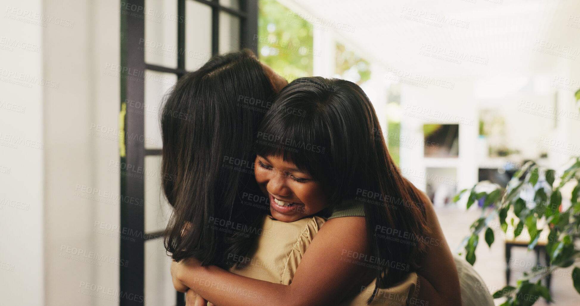 Buy stock photo Mom, child or hug with greeting in home for love, safety or care together by door or entrance. Mother, kid or daughter with smile, parent or guardian for embrace, farewell or holiday goodbye in house