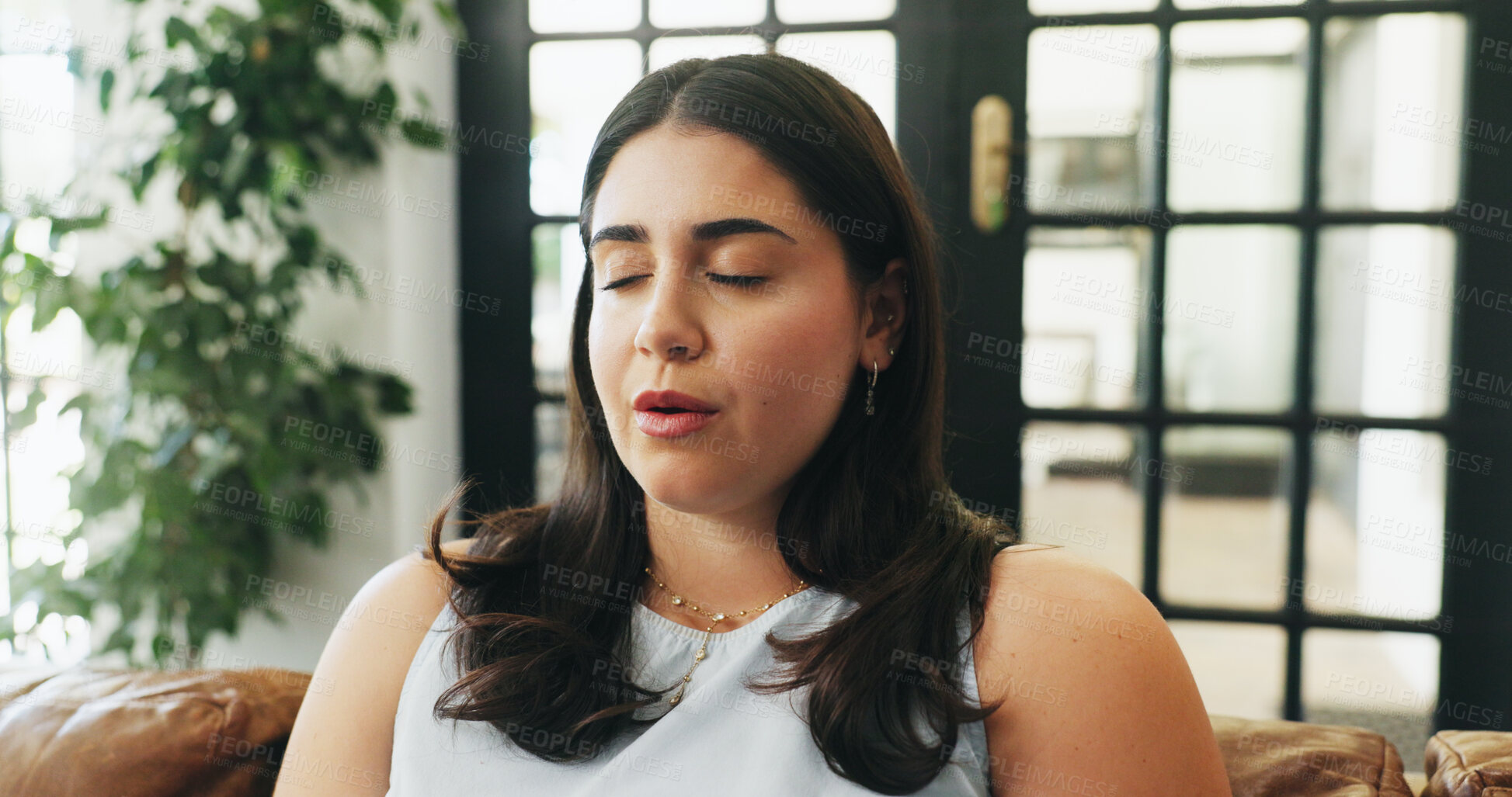 Buy stock photo Breathing, calm and woman on sofa in home for anxiety, stress relief or relax on weekend. Zen, peaceful and female person in living room with mindfulness, mental health or break in morning at house.