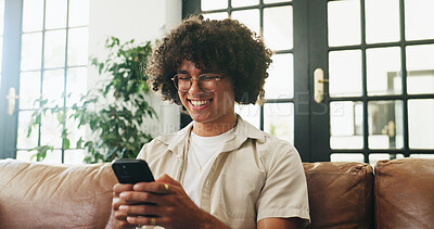 Buy stock photo Phone, happy and man on sofa in home with networking, communication or chatting on mobile app. Relax, smile and male person with cellphone for online texting, blog or contact in living room at house.