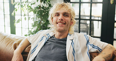 Buy stock photo Happy, smile and portrait of man on sofa for resting, comfortable and chill on weekend in home. Apartment, relax and person on couch for me time, break and holiday with positivity in living room