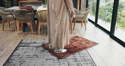 Buy stock photo Legs, home and muslim person with prayer mat for faith, religion and hope for Ramadan Kareem. Islam, praying and worship God with spiritual devotion, start salah and gratitude for Allah in house