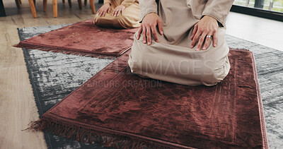 Buy stock photo Muslim couple, home and prayer with hands for faith, religion or praise for Ramadan Kareem. Islam, man and woman praying to worship God with spiritual devotion, salah and gratitude for Allah in house