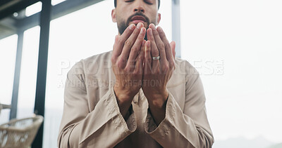 Buy stock photo Hands, home and muslim man with prayer for religion, faith and dua on Ramadan Kareem. Islam, praying and person worship God with spiritual devotion, salah and gratitude for Allah with low angle