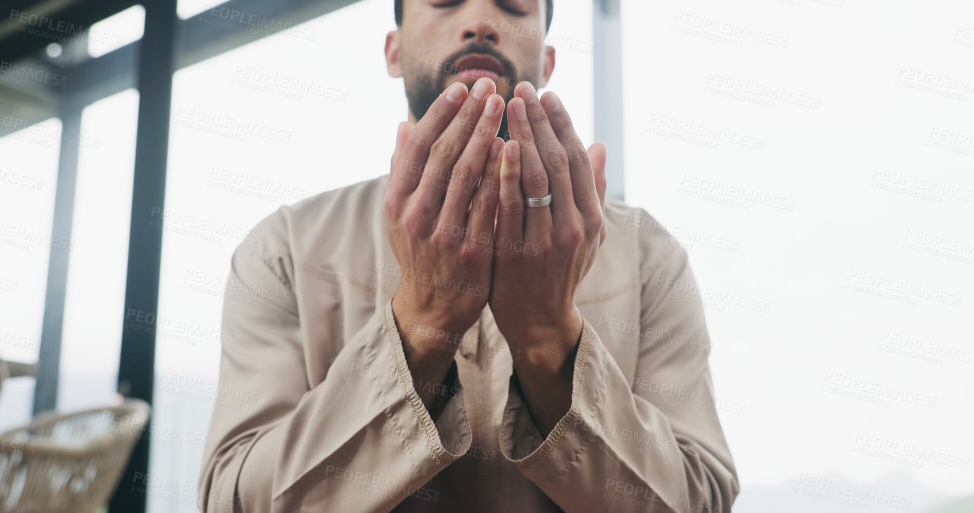 Buy stock photo Hands, home and muslim man with prayer for religion, faith and dua on Ramadan Kareem. Islam, praying and person worship God with spiritual devotion, salah and gratitude for Allah with low angle