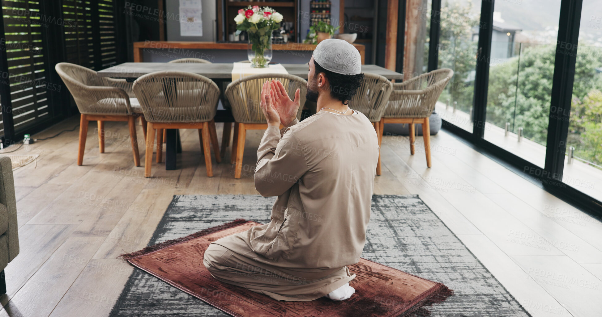 Buy stock photo Muslim, man and prayer in home for religion, faith and dua on Ramadan Kareem in house. Islam, praying and person worship God with spiritual devotion with praise, salah and gratitude for Allah