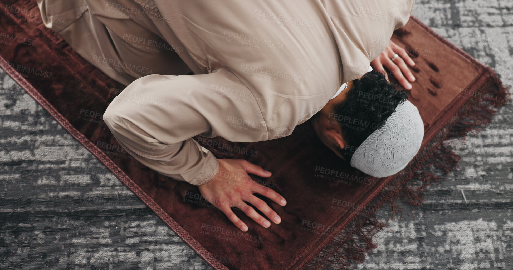Buy stock photo Muslim, man and prayer with bow for faith, religion and dua on Ramadan Kareem above in home. Islam, praying and person worship God with spiritual devotion, salah and praise Allah on mat in house