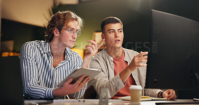 Buy stock photo Night, people and tablet in office with computer, campaign review or discussion for digital marketing. Late, team and conversation with tech for planning, brainstorming or online advertising insight.