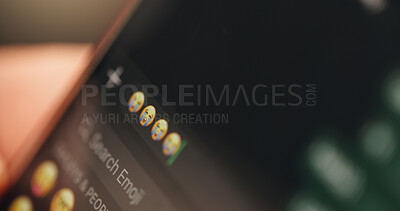 Buy stock photo Person, hands and phone with screen for emoji, message and text app for connection and networking. People, smartphone and closeup with crying face icon on social media for contact and communication