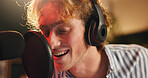 Musician, man and singing with mic for audio, recording or night broadcast for radio host dj. Live streaming, headphones or content creator with music for online production or performance on tech
