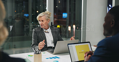 Buy stock photo Night, meeting and woman in office with team, business people and brainstorming ideas at digital agency. Research, overtime and mature person with graphs, management review or working late for report