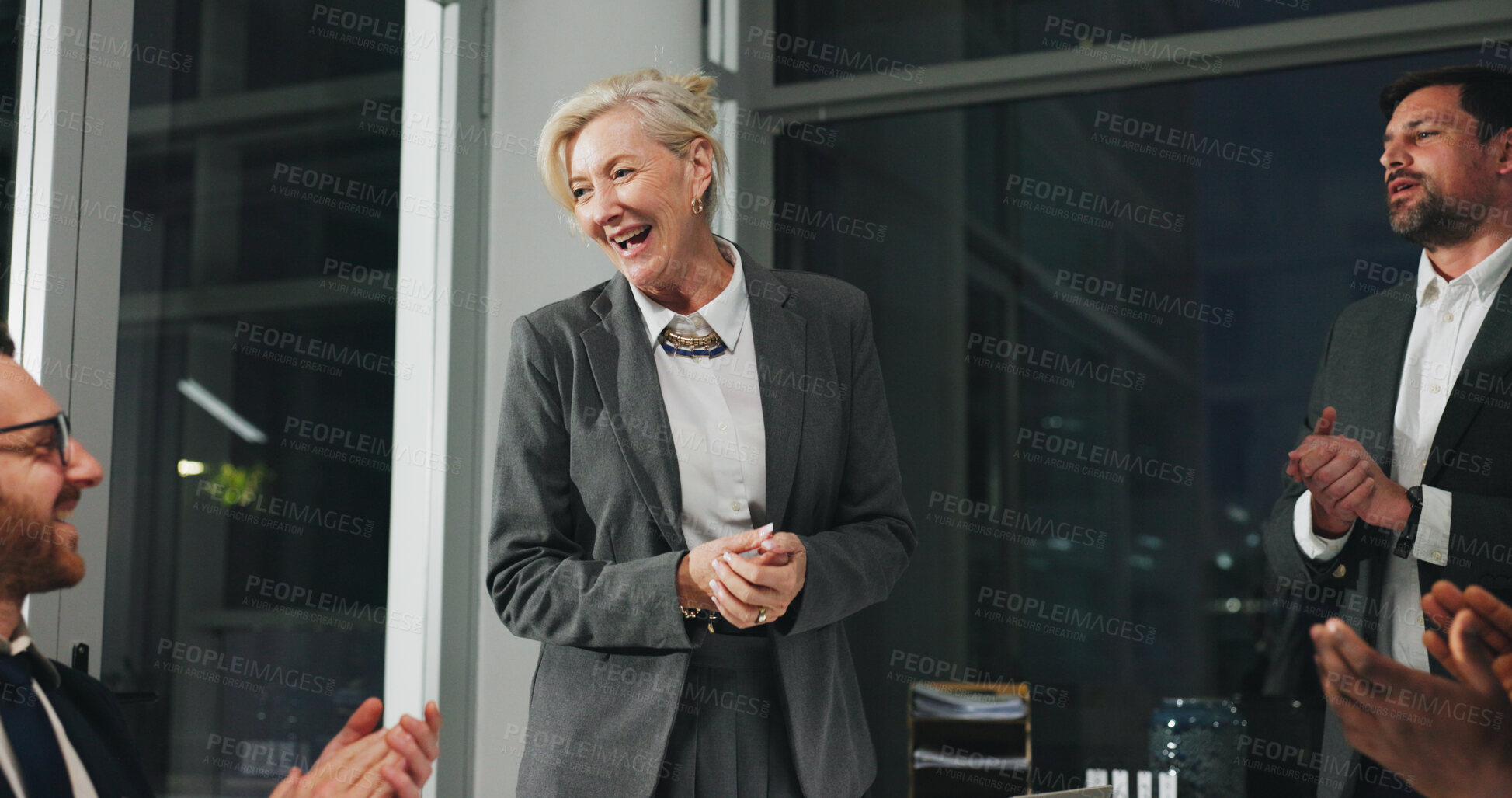 Buy stock photo Night, meeting and woman in office with applause, business people and celebration at digital agency. Clapping hands, overtime and team with success, management review and working late for report
