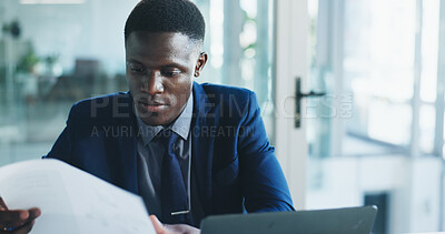 Buy stock photo Finance, review or analyst in office with paper, funding check or data analysis for budget pitch. Research, paperwork and black man with laptop, profit report or proposal update for investment plan.
