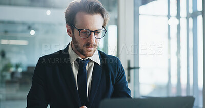 Buy stock photo Finance, laptop and typing with business man in office for corporate report or risk management. Computer, reading and review with financial employee at desk in workplace for accounting update