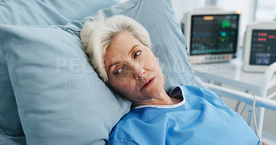 Buy stock photo Thinking, sick and old woman in hospital bed, recovery and wellness with contemplation. Mature person, medical service and patient in clinic, reflection and healing for operation, medicare or comfort
