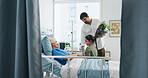 Grandmother, kid and parent with flowers in hospital, get well soon gift and family visit for healing. Healthcare, senior woman and people with bouquet for medical recovery support, love and present