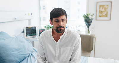 Buy stock photo Medical, upset or man on hospital bed with thinking, appointment stress or waiting for surgery result. Healthcare, anxiety or patient in clinic with fear, reflection or diagnosis worry in checkup.