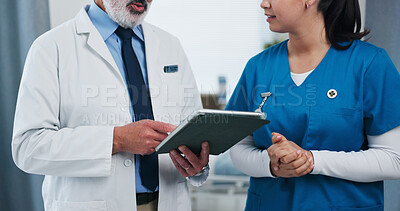 Buy stock photo Hands, doctors and tablet for discussion at clinic with review, checklist and insight for medical report. People, nurse and surgeon with tech, app and feedback with healthcare services at hospital