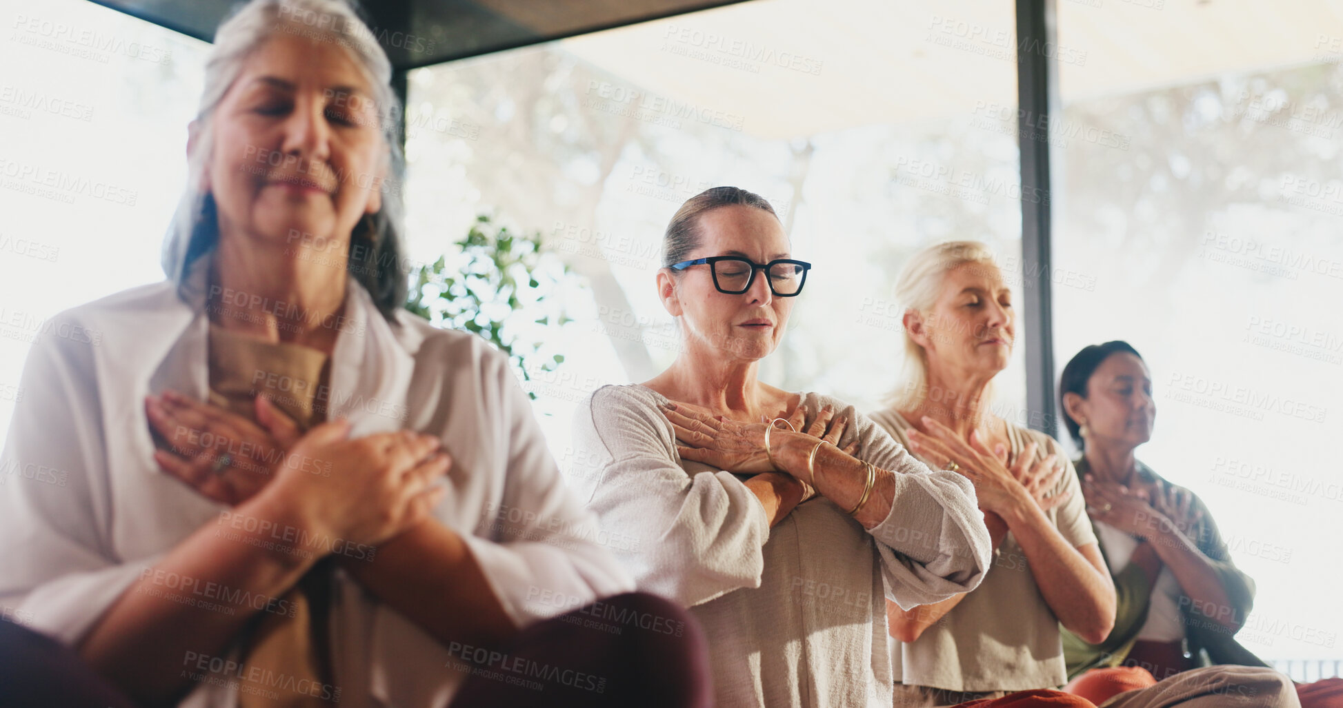 Buy stock photo Exercise, meditation and yoga with senior people in studio for balance, inner peace or mindfulness. Awareness, fitness and zen with group of calm old women in wellness class for mental health