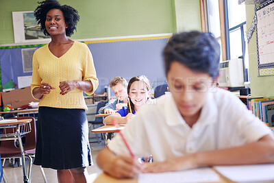 Buy stock photo Learning, education and portrait of teacher with students in elementary school classroom. Development, scholarship and group of children writing test, exam or studying with happy black woman teaching
