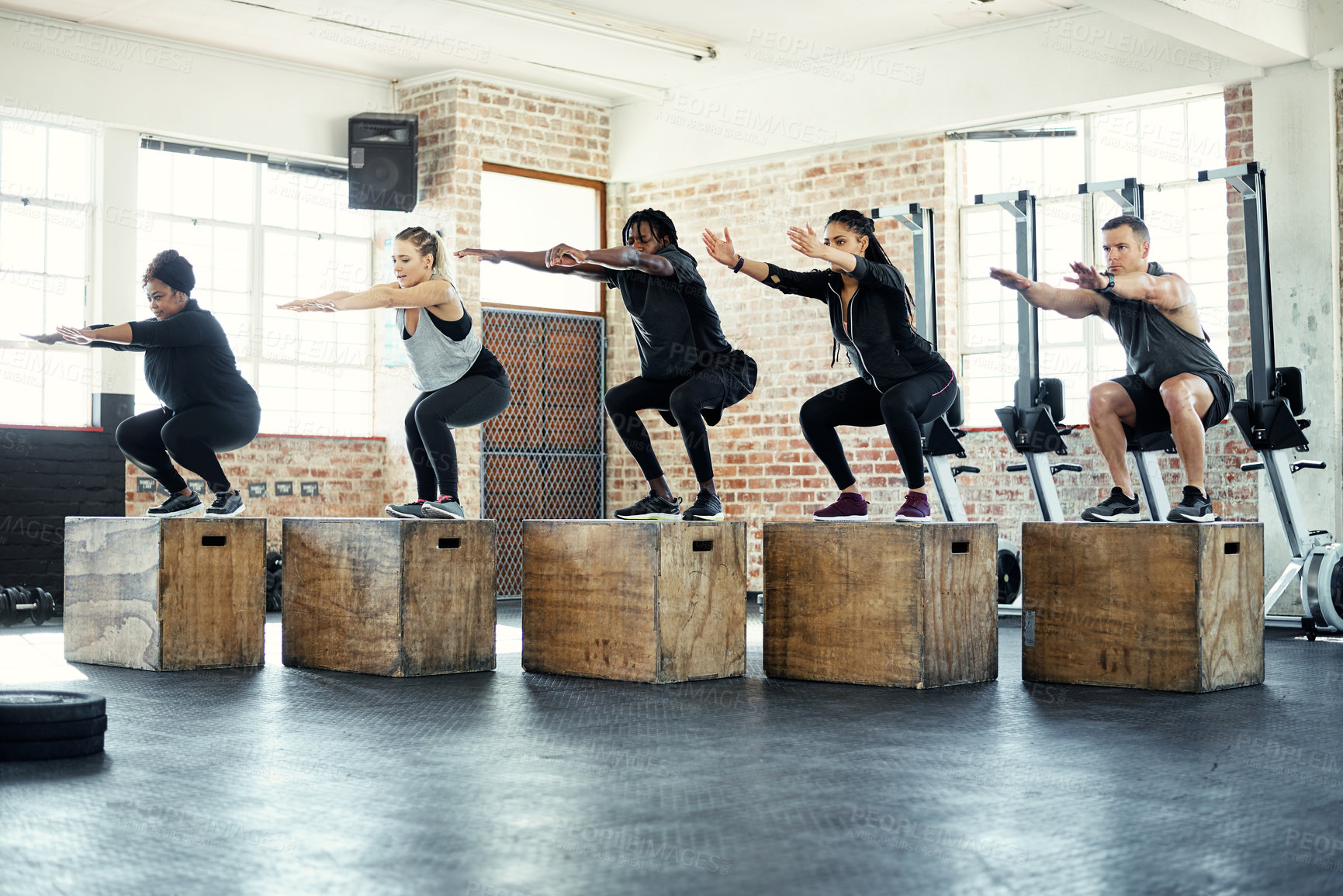 Buy stock photo Fitness, lunge or team in gym class with crates, cardio workout or calorie burn in balance training. Exercise, people or instructor with equipment, group session or intense jumping for weight loss.