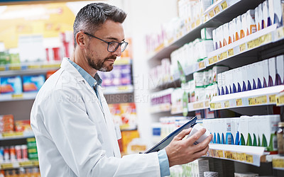 Buy stock photo Pharmacist, man and clipboard with pills at shelf for prescription, inventory or drugs info. Professional, mature person and stock checklist in pharmacy for product label, expiry date and inspection
