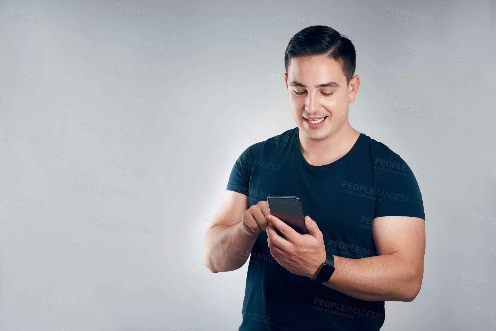 Buy stock photo Design, phone and space with man in studio for communication, online planning or research. App, mobile scrolling and typing with designer person isolated on white background for text message update