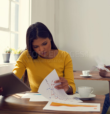 Buy stock photo Woman, document or reading in business with tablet, article trends or review in creative office. Writer, admin and paperwork in agency for journalist update, topic research or graphs for planning
