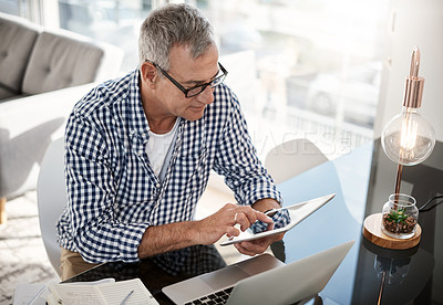 Buy stock photo Tablet, laptop or man with remote work in home for finance report, budget comparison or above. Mature person, freelance financial manager and tech for risk assessment, investment app or market trends
