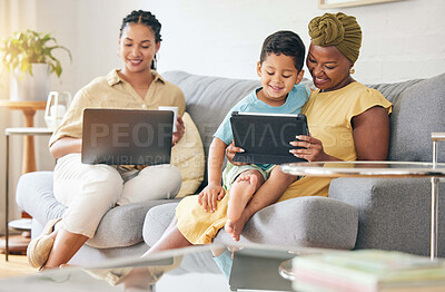 Buy stock photo Technology, tablet and family child, mom or black woman reading online ebook, e learning and remote education. Studying, lesbian mothers or relax gay people teaching kid on home living room couch