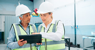 Buy stock photo Women, robotics and planning in factory, tablet and conversation with software update. Employees, engineering and people in lab, technician or teamwork with app, design review or configuration system