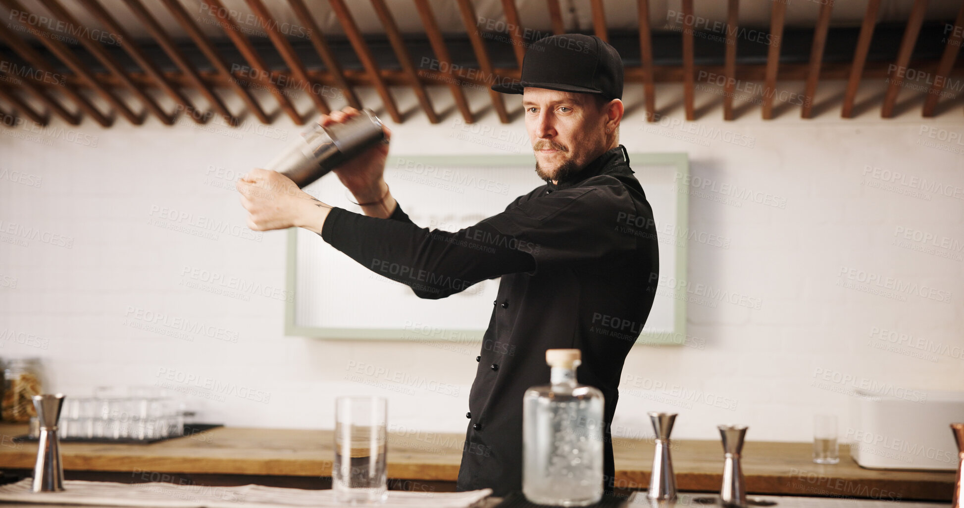 Buy stock photo Cocktail, cafe and bartender man with shaker, glass and tools for artisan beverage recipe. Mixology, small business pub and barman at gin bar counter with happy hour drinks, process and craft alcohol