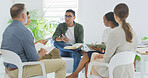 Creative, man and meeting with staff in office for discussion, planning and article feedback. People, journalist and manager speaking for teamwork, story brainstorming and information for publication