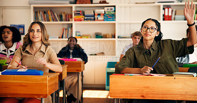 Buy stock photo Question, lesson and students in classroom at high school with learning, education or participation in class. Teen, group and girl with hand raised for knowledge, academic development and interaction