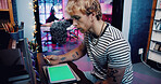 Man, tattoo artist or tablet with green screen in shop for digital art or creative planning. Male person, tattooist or designer with technology display for precision, styling or retouch in body store