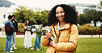 Portrait, student or woman on campus with textbook for college scholarship, education or english degree. Happy, person outdoor or books at university for literature study, knowledge or academic goals