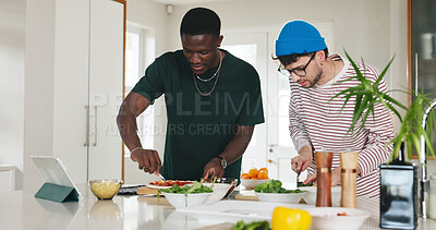 Buy stock photo Cooking, food and pizza with people in kitchen of home together to follow online recipe tutorial. App, tablet and video instructions with roommate friends at counter in apartment for meal preparation
