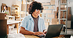 Man, reading and laptop at startup ecommerce to confirm order, quality control and inventory. Male person, pc and online checklist for supply chain, delivery price and information with catalog update