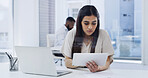 Woman, research and tablet in creative agency with laptop, campaign plan or review for email marketing. Coworking, female person and browse in office with tech, digital app or newsletter advertising.