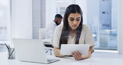 Buy stock photo Woman, research and tablet in creative agency with laptop, campaign plan or review for email marketing. Coworking, female person and browse in office with tech, digital app or newsletter advertising.