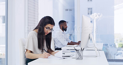 Buy stock photo Creative, woman and writing in office with computer, news report research or planning for journalism. Coworking, person and glasses in workplace with pc, notes and article idea for media publication.