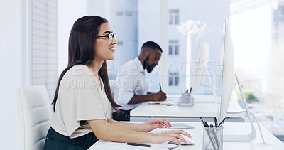 Buy stock photo Creative, woman and browsing in office with computer, reading news report and story for journalism. Coworking, person and research in workplace with pc, smile and check article for media publication.