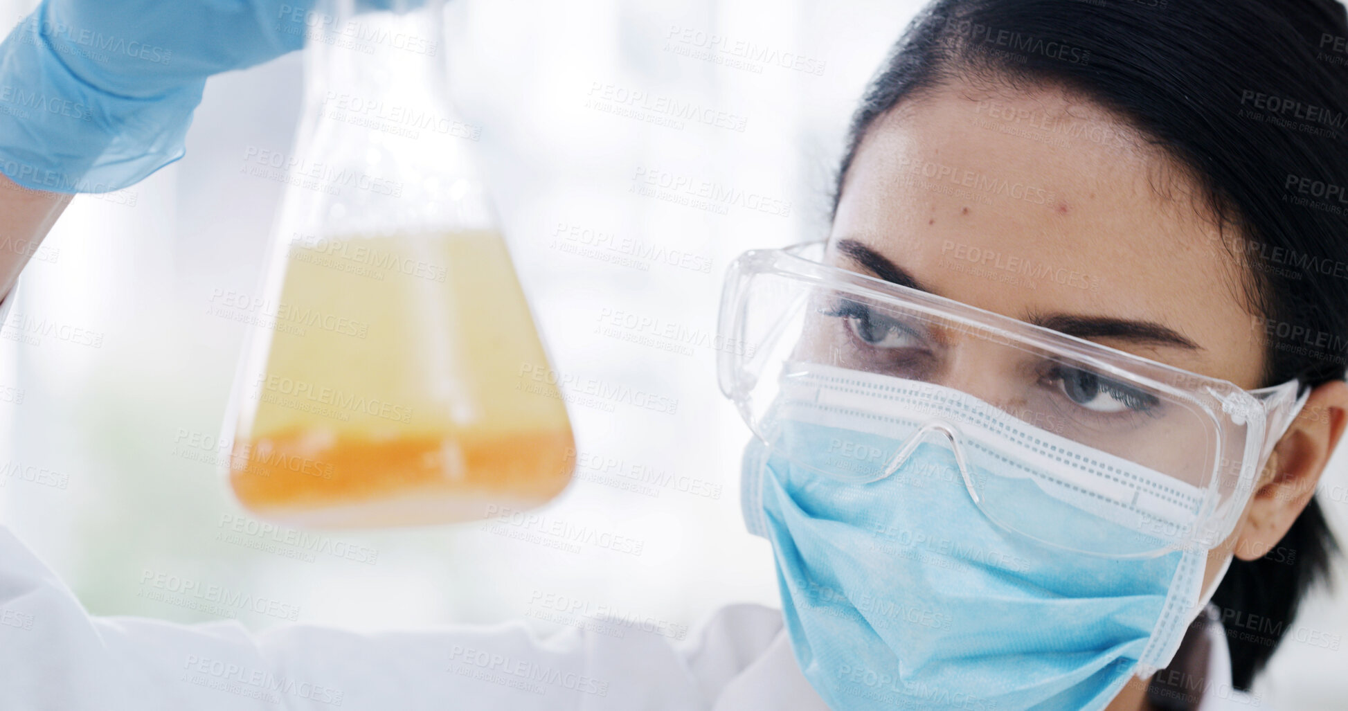 Buy stock photo Woman, beaker and scientist at lab with liquid, sample or reaction medical research for virus cure. Person, mask and goggles for science with insight, pharmaceutical study or vaccine development