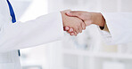 People, scientist and meeting with handshake in lab for welcome, partnership and research deal. Team, shaking hands and introduction for agreement, medical negotiation and onboarding for experiment