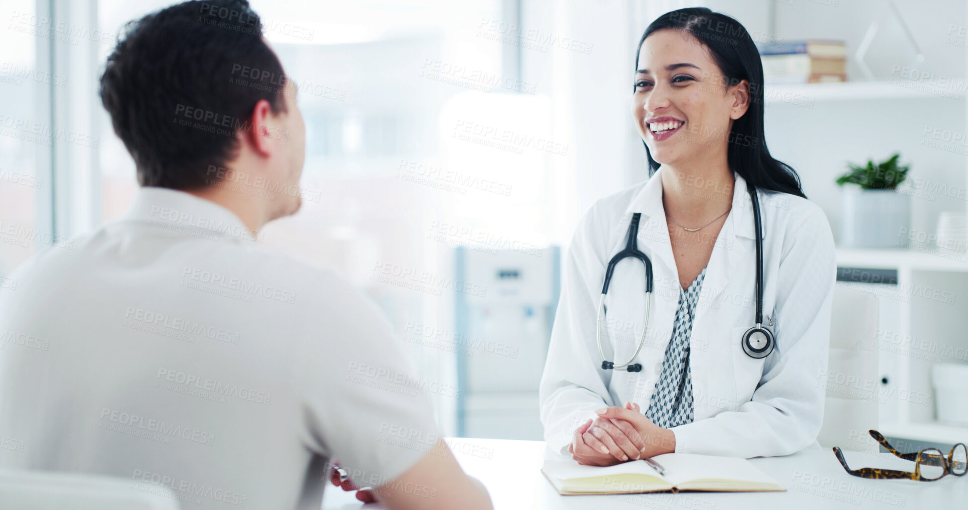 Buy stock photo Happy, office and doctor with man for consultation, medical service and advice for treatment plan. Healthcare, clinic and woman with patient talking for appointment, checkup and help for wellness